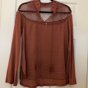Free People long sleeve top with lace and netting top.
